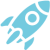 Simple blue rocket icon tilted to the right, with two fins and a circular window, on a light gray background.